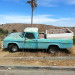 Blue truck parked at the top of N Broadway - Coral St. Stairs.  Ascot Hills Park in background. thumbnail